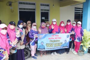 TP PKK Kota Metro Adakan Aksi Tabuh Dengan Lakukan Bakti Sosial