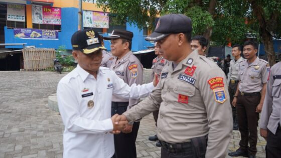 Qomaru Pimpin Apel Satkamling Pasar di Metro