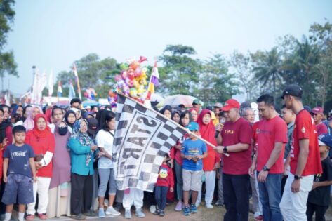 Asisten I Hadiri Jalan Sehat HUT RI di Hadimulyo Timur