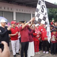 Semarak HUT RI ke-81, Warga Hadimulyo Timur Ikuti Jalan Sehat Berhadiah Motor